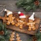 Gingerbread men on cutting board